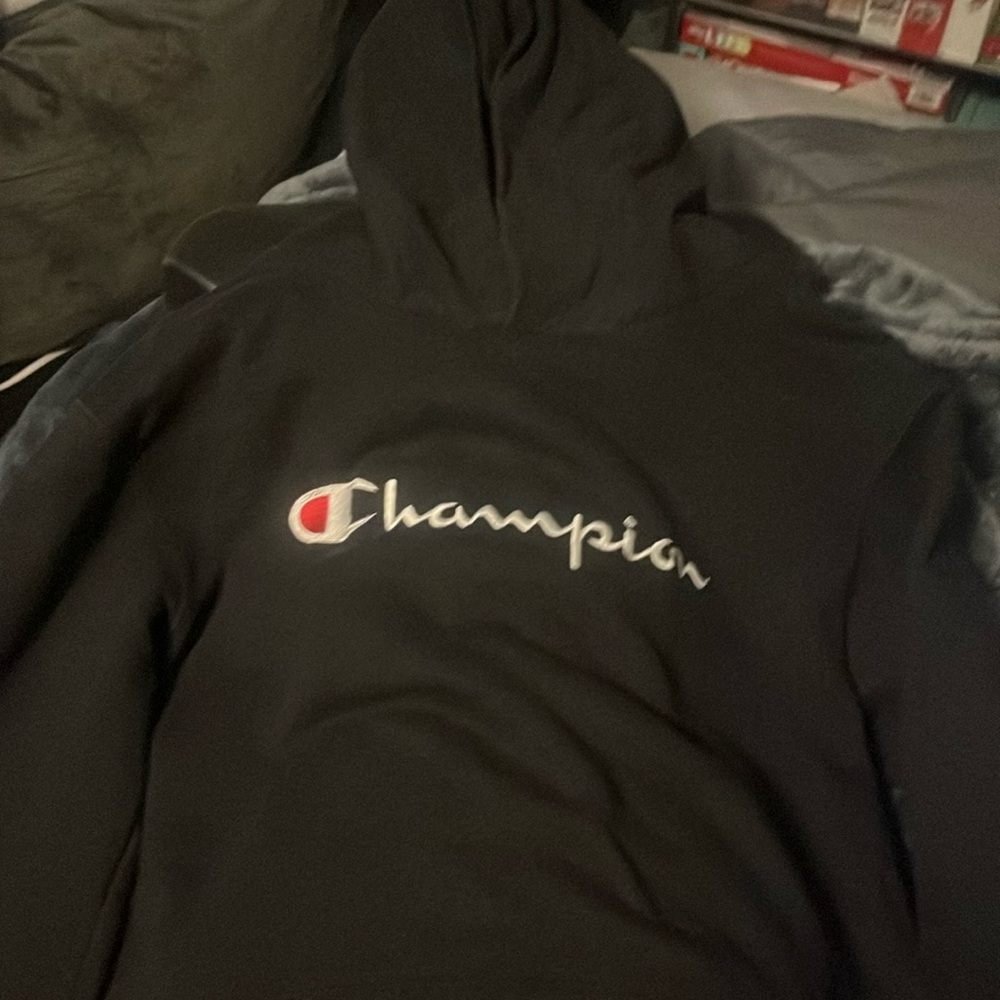Youth black champion hoodie.